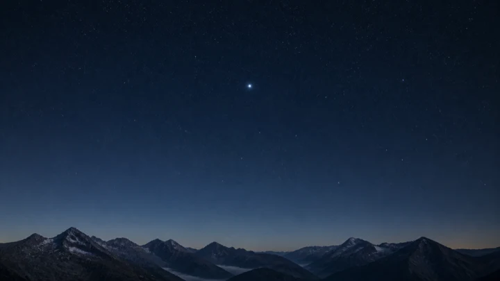 Polaris above a calm mountain horizon
